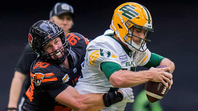 Jun 17, 2023; Vancouver, British Columbia, CAN; BC Lions defensive lineman Mathieu Betts (90) sacks Edmonton Elks quarterback Taylor Cornelius (15) in the second half at BC Place. BC won 22-0. Mandatory Credit: Bob Frid-USA TODAY Sports  